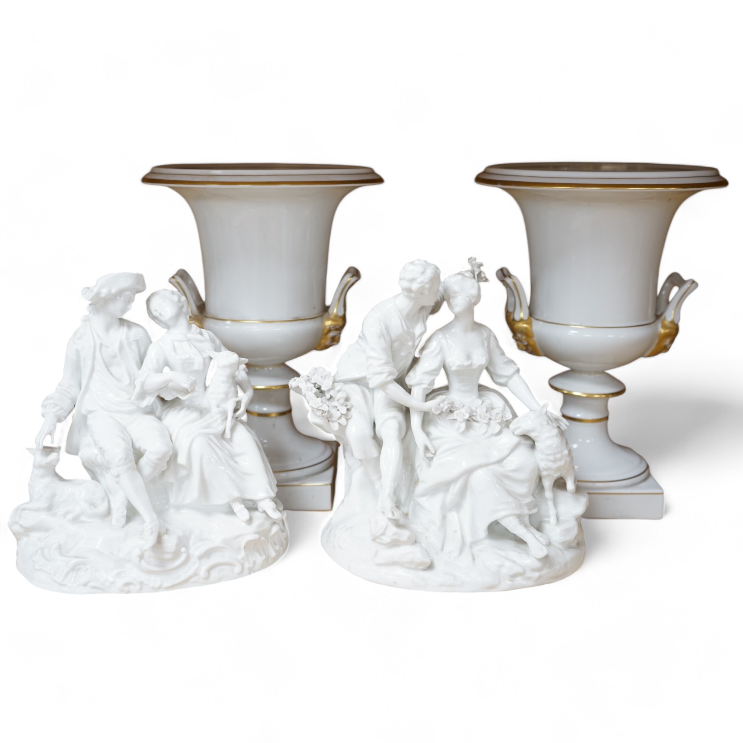 Two Meissen style figure groups, tallest 21cm, and a pair of urns, 26.5cm.